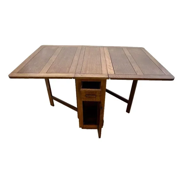 1920s Antique Gate Leg Table Drop Down Sides Center Drawer and Cabinet Rectangle Oak