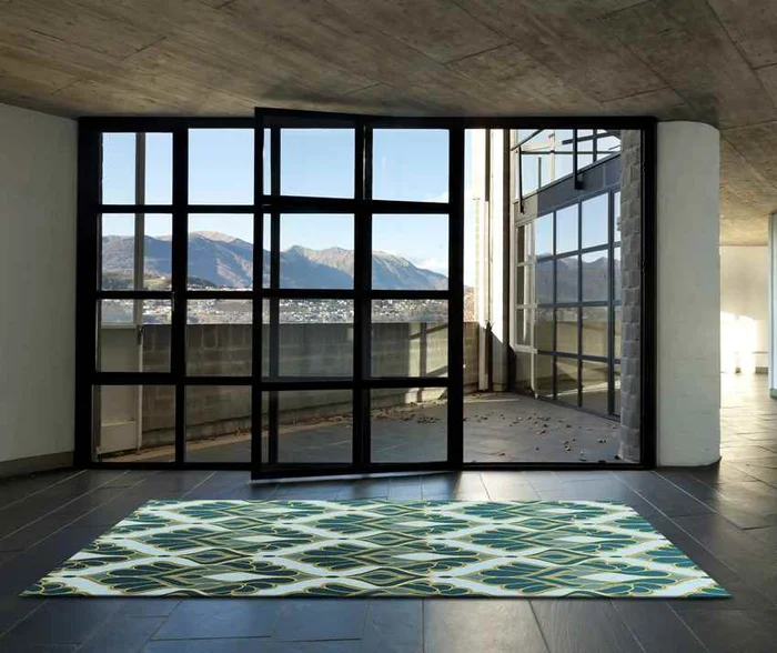 Adeline Global Teal Area Rug