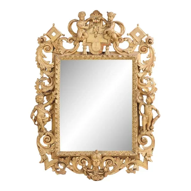 French Figural Carved Giltwood Mirror, C. 1860.