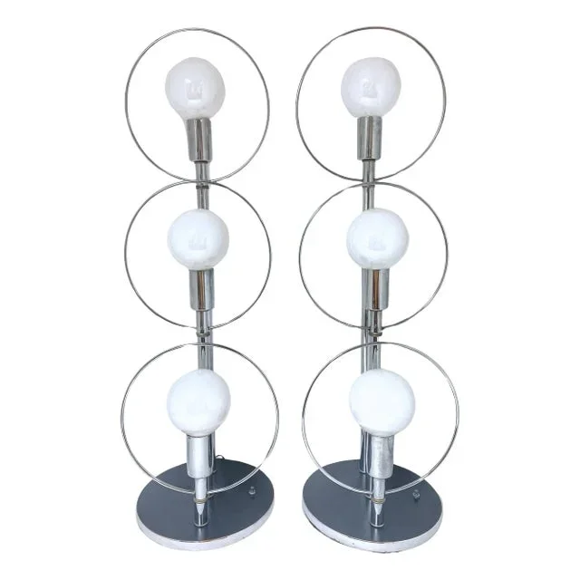 Tall 70s’ polished Chrome Mod Ring Lamps, Attributed to Robert Sonneman – a Pair